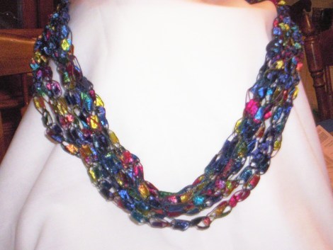 \"http:\/\/grammiepammie.wordpress.com\/crocheted-necklace-from-trellis-ribbon\/\"